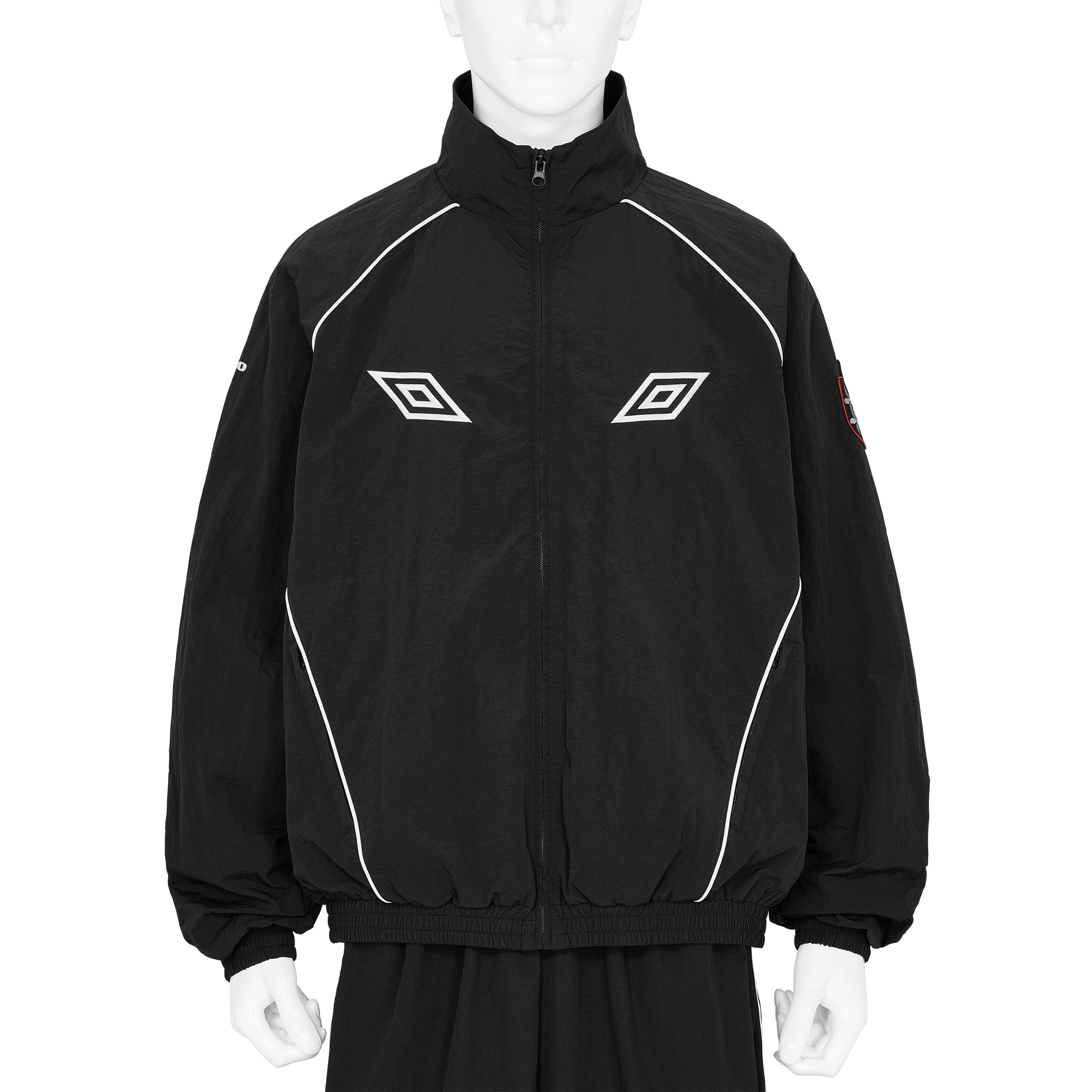 EYES TRACK JACKET BLACK - SLAM JAM and UMBRO(スラムジャム アンド